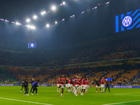 The team of AC Milan celebrates during the match between FC Internazionale and AC Milan, Serie A, at Giuseppe Meazza Stadium in Milan, Italy...