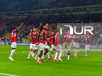 The team of AC Milan celebrates during the match between FC Internazionale and AC Milan, Serie A, at Giuseppe Meazza Stadium in Milan, Italy...