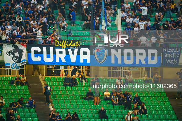 Supporters of FC Inter during the match between FC Internazionale and AC Milan in Serie A at Giuseppe Meazza Stadium in Milan, Italy, on Sep...