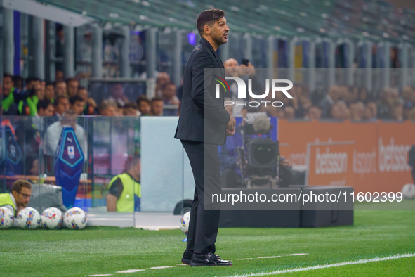 Paulo Fonseca is the head coach of AC Milan during the match between FC Internazionale and AC Milan in Serie A at Giuseppe Meazza Stadium in...