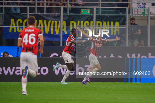 Christian Pulisic celebrates a goal during the match between FC Internazionale and AC Milan in Serie A at Giuseppe Meazza Stadium in Milan,...