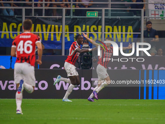 Christian Pulisic celebrates a goal during the match between FC Internazionale and AC Milan in Serie A at Giuseppe Meazza Stadium in Milan,...