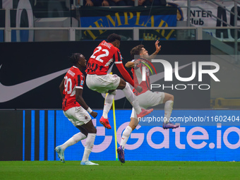 Christian Pulisic celebrates a goal during the match between FC Internazionale and AC Milan in Serie A at Giuseppe Meazza Stadium in Milan,...