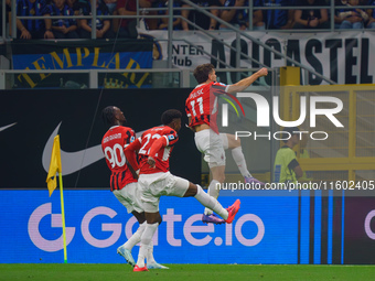 Christian Pulisic celebrates a goal during the match between FC Internazionale and AC Milan in Serie A at Giuseppe Meazza Stadium in Milan,...