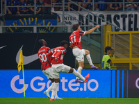 Christian Pulisic celebrates a goal during the match between FC Internazionale and AC Milan in Serie A at Giuseppe Meazza Stadium in Milan,...