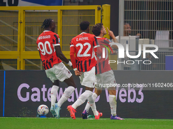 Christian Pulisic celebrates a goal during the match between FC Internazionale and AC Milan in Serie A at Giuseppe Meazza Stadium in Milan,...