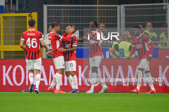 Christian Pulisic celebrates a goal during the match between FC Internazionale and AC Milan in Serie A at Giuseppe Meazza Stadium in Milan,...