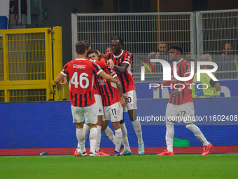 Christian Pulisic celebrates a goal during the match between FC Internazionale and AC Milan in Serie A at Giuseppe Meazza Stadium in Milan,...