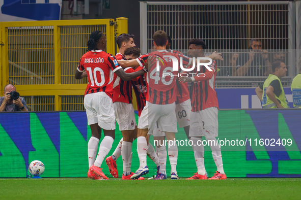 Christian Pulisic celebrates a goal during the match between FC Internazionale and AC Milan in Serie A at Giuseppe Meazza Stadium in Milan,...