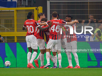 Christian Pulisic celebrates a goal during the match between FC Internazionale and AC Milan in Serie A at Giuseppe Meazza Stadium in Milan,...