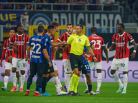 Maurizio Mariani referees during the match between FC Internazionale and AC Milan in Serie A at Giuseppe Meazza Stadium in Milan, Italy, on...