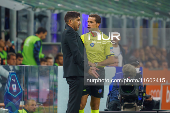 Paulo Fonseca is the head coach of AC Milan during the match between FC Internazionale and AC Milan in Serie A at Giuseppe Meazza Stadium in...