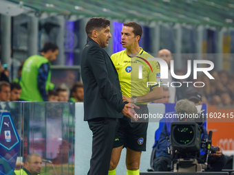 Paulo Fonseca is the head coach of AC Milan during the match between FC Internazionale and AC Milan in Serie A at Giuseppe Meazza Stadium in...