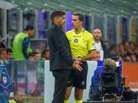 Paulo Fonseca is the head coach of AC Milan during the match between FC Internazionale and AC Milan in Serie A at Giuseppe Meazza Stadium in...