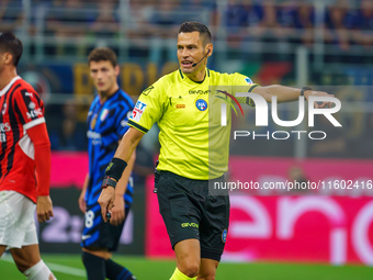 Maurizio Mariani referees during the match between FC Internazionale and AC Milan in Serie A at Giuseppe Meazza Stadium in Milan, Italy, on...