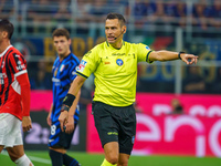 Maurizio Mariani referees during the match between FC Internazionale and AC Milan in Serie A at Giuseppe Meazza Stadium in Milan, Italy, on...