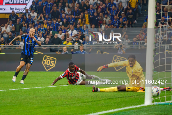 Federico Dimarco scores a goal during the match between FC Internazionale and AC Milan in Serie A at Giuseppe Meazza Stadium in Milan, Italy...