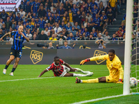 Federico Dimarco scores a goal during the match between FC Internazionale and AC Milan in Serie A at Giuseppe Meazza Stadium in Milan, Italy...