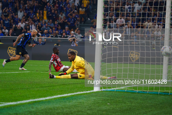 Federico Dimarco scores a goal during the match between FC Internazionale and AC Milan in Serie A at Giuseppe Meazza Stadium in Milan, Italy...