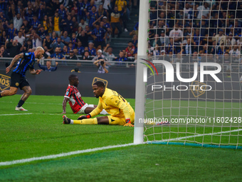 Federico Dimarco scores a goal during the match between FC Internazionale and AC Milan in Serie A at Giuseppe Meazza Stadium in Milan, Italy...