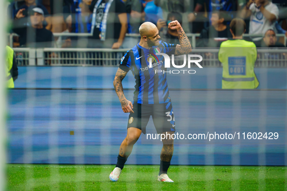 Federico Dimarco celebrates a goal during the match between FC Internazionale and AC Milan in Serie A at Giuseppe Meazza Stadium in Milan, I...