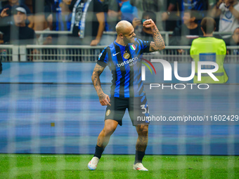 Federico Dimarco celebrates a goal during the match between FC Internazionale and AC Milan in Serie A at Giuseppe Meazza Stadium in Milan, I...