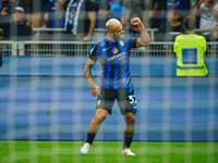 Federico Dimarco celebrates a goal during the match between FC Internazionale and AC Milan in Serie A at Giuseppe Meazza Stadium in Milan, I...