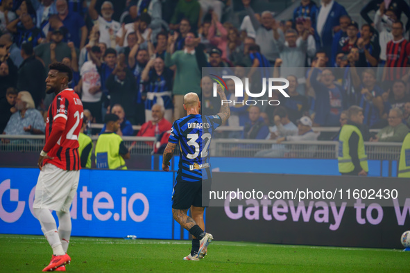 Federico Dimarco celebrates a goal during the match between FC Internazionale and AC Milan in Serie A at Giuseppe Meazza Stadium in Milan, I...