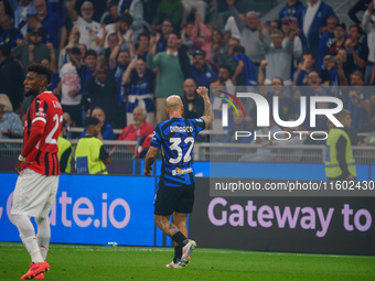 Federico Dimarco celebrates a goal during the match between FC Internazionale and AC Milan in Serie A at Giuseppe Meazza Stadium in Milan, I...