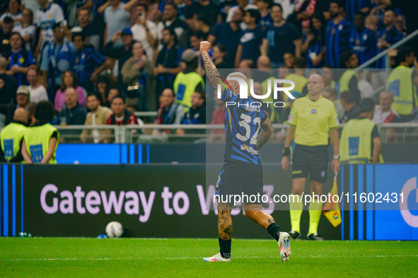 Federico Dimarco celebrates a goal during the match between FC Internazionale and AC Milan in Serie A at Giuseppe Meazza Stadium in Milan, I...