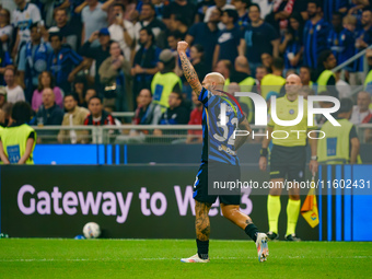 Federico Dimarco celebrates a goal during the match between FC Internazionale and AC Milan in Serie A at Giuseppe Meazza Stadium in Milan, I...