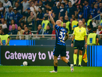 Federico Dimarco celebrates a goal during the match between FC Internazionale and AC Milan in Serie A at Giuseppe Meazza Stadium in Milan, I...