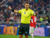 Maurizio Mariani referees during the match between FC Internazionale and AC Milan in Serie A at Giuseppe Meazza Stadium in Milan, Italy, on...