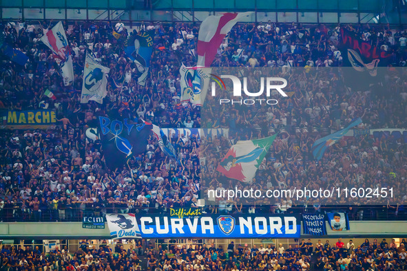 Supporters of FC Inter during the match between FC Internazionale and AC Milan in Serie A at Giuseppe Meazza Stadium in Milan, Italy, on Sep...