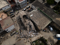 People dig through the rubble of a building that collapses in Saviano, near Naples, on Sunday morning. According to initial reconstructions,...