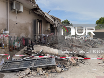 People dig through the rubble of a building that collapses in Saviano, near Naples, on Sunday morning. According to initial reconstructions,...