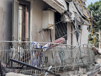 People dig through the rubble of a building that collapses in Saviano, near Naples, on Sunday morning. According to initial reconstructions,...