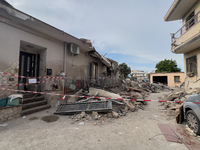 People dig through the rubble of a building that collapses in Saviano, near Naples, on Sunday morning. According to initial reconstructions,...