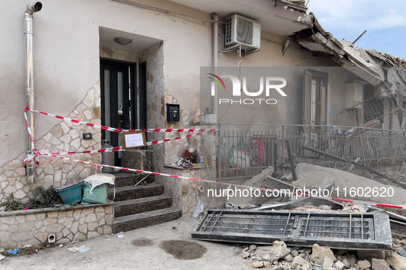 People dig through the rubble of a building that collapses in Saviano, near Naples, on Sunday morning. According to initial reconstructions,...