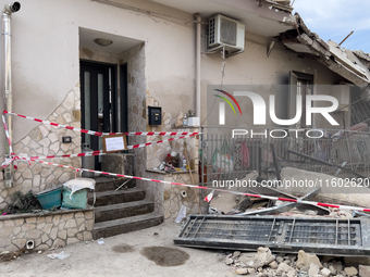 People dig through the rubble of a building that collapses in Saviano, near Naples, on Sunday morning. According to initial reconstructions,...