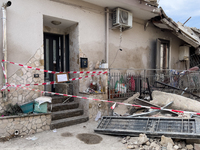 People dig through the rubble of a building that collapses in Saviano, near Naples, on Sunday morning. According to initial reconstructions,...