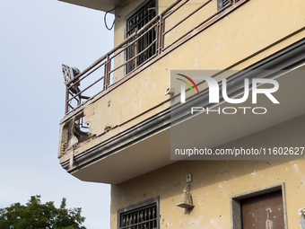 People dig through the rubble of a building that collapses in Saviano, near Naples, on Sunday morning. According to initial reconstructions,...