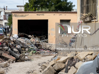 People dig through the rubble of a building that collapses in Saviano, near Naples, on Sunday morning. According to initial reconstructions,...