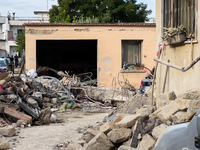 People dig through the rubble of a building that collapses in Saviano, near Naples, on Sunday morning. According to initial reconstructions,...