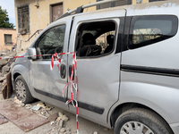 People dig through the rubble of a building that collapses in Saviano, near Naples, on Sunday morning. According to initial reconstructions,...