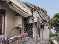 People dig through the rubble of a building that collapses in Saviano, near Naples, on Sunday morning. According to initial reconstructions,...