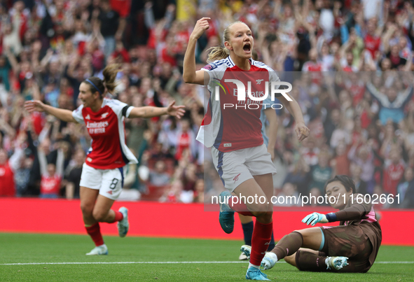 Goalkeeper Ayaka Yamashita watches Frida Maanum celebrate during the Barclays FA Women's Super League match between Arsenal and Manchester C...