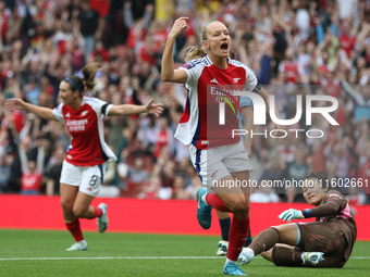 Goalkeeper Ayaka Yamashita watches Frida Maanum celebrate during the Barclays FA Women's Super League match between Arsenal and Manchester C...