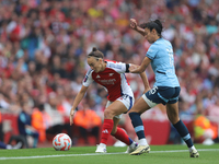 Caitlin Foord and Leila Ouahabi fight for the ball as it goes out of play during the Barclays FA Women's Super League match between Arsenal...