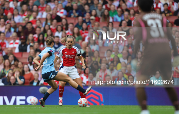 Katie McCabe and Kerstin Casparij during the Barclays FA Women's Super League match between Arsenal and Manchester City at the Emirates Stad...